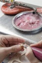 Dental technician doing partial dentures of acrylic resins.