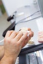 Dental technician`s hands Royalty Free Stock Photo