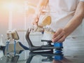 Dental technician working with articulator in dental lab Royalty Free Stock Photo