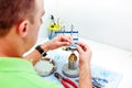 Dental technician working with artificial implants Royalty Free Stock Photo