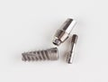 Dental titanium implant with locking elements