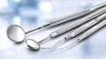 Dental tools arranged on a clinical surface for oral examination Royalty Free Stock Photo