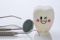 Dental tools and smile teeth model. Royalty Free Stock Photo