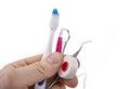 Dental tools with toothbrush interdental pick and floss. Royalty Free Stock Photo