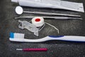 Dental tools with toothbrush interdental pick and floss. Royalty Free Stock Photo