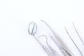 Dental tools on white background Royalty Free Stock Photo