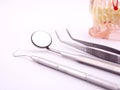 Dental tools on white background Royalty Free Stock Photo