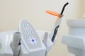 Dental UV curing light lamp . Ultraviolet polymerization Light Tool With Orange blocking glass. tooth care concept.