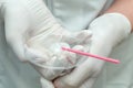 Dental whitening gel in the hands of a dentist