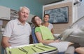 Dentist assistant and patient in the treatment room