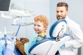 Dentist with boy at the dental office Royalty Free Stock Photo