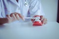 Dentist diagnose plastic teeth models with toothbrush,Concept of dental checking,Selective focus denture Royalty Free Stock Photo