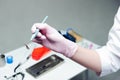 Dentist doctor hand holding medical tools in dental office. Concept of healthy Royalty Free Stock Photo