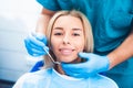 Dentist examinating girl