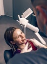 Dentist examine the colour of teeth Royalty Free Stock Photo