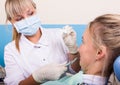 Dentist examines the oral cavity on tooth decay. Royalty Free Stock Photo