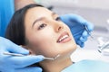 Dentist examines the patients teeth Royalty Free Stock Photo