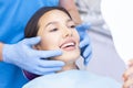 Dentist examines the patients teeth Royalty Free Stock Photo