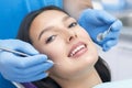 Dentist examines the patients teeth Royalty Free Stock Photo