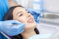 Dentist examines the patients teeth Royalty Free Stock Photo