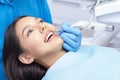 Dentist examines the patients teeth Royalty Free Stock Photo