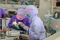 Dentist examining a patient teeth in medical treat dental