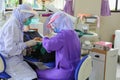 Dentist examining a patient teeth in medical treat dental