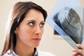 Dentist Examining X-Ray Royalty Free Stock Photo