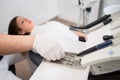 Dentist with gloved hands is treating patient with dental tools in dental office. Dentistry