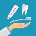 Dentist hand with a toothbrush and toothpaste. Hygiene concept
