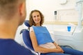 Dentist having consultation with patient in his ambulance.