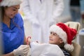 Dentist and her cute patient