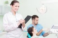 Dentist and his assistant at work Royalty Free Stock Photo