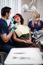 Dentist and his assitant working in private practice Royalty Free Stock Photo