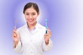 Dentist hold with mirror and toothbrush Royalty Free Stock Photo