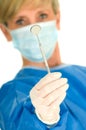 Dentist holding dental mirror Royalty Free Stock Photo