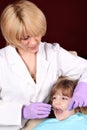 Dentist and little girl patient