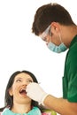 Dentist male working with patient woman