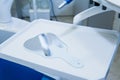 Dentist mirrow on the working surface with other equipment on the background in dental office. Selective focus Royalty Free Stock Photo