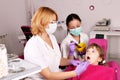 Dentist nurse and little girl