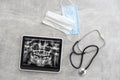 Dentist Office-Digital tablet with a patients x-rays Royalty Free Stock Photo