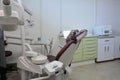Dentist office, with medical equipment, cabinets, negatoscope with white walls, Brazil, South America and autoclave