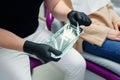 Dentist opening sealed sterile dental tools, close up. Professional dentist preparing his workplace. Royalty Free Stock Photo