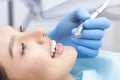 Dentist and patient in the dental office. Woman having teeth examined Royalty Free Stock Photo