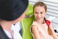 Dentist and Patient in Dentist Office. Child in the Dental Chair Royalty Free Stock Photo