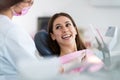 Dentist and patient in dentist office Royalty Free Stock Photo