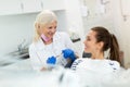 Dentist and patient in dentist office