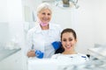 Dentist and patient in dentist office