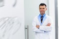 Dentist Portrait. Young Doctor at Dental Clinic. Teeth Care