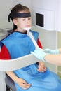 Dentist prepare boy to jaw x-ray image Royalty Free Stock Photo